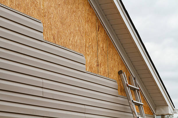 Professional Siding Replacement technician working in Mount Sinai, NY